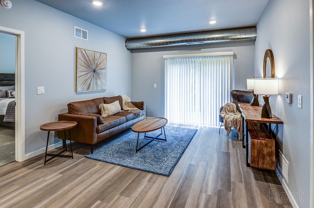 a living room with a couch and a table