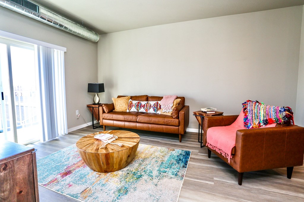 a living room with two couches and a coffee table