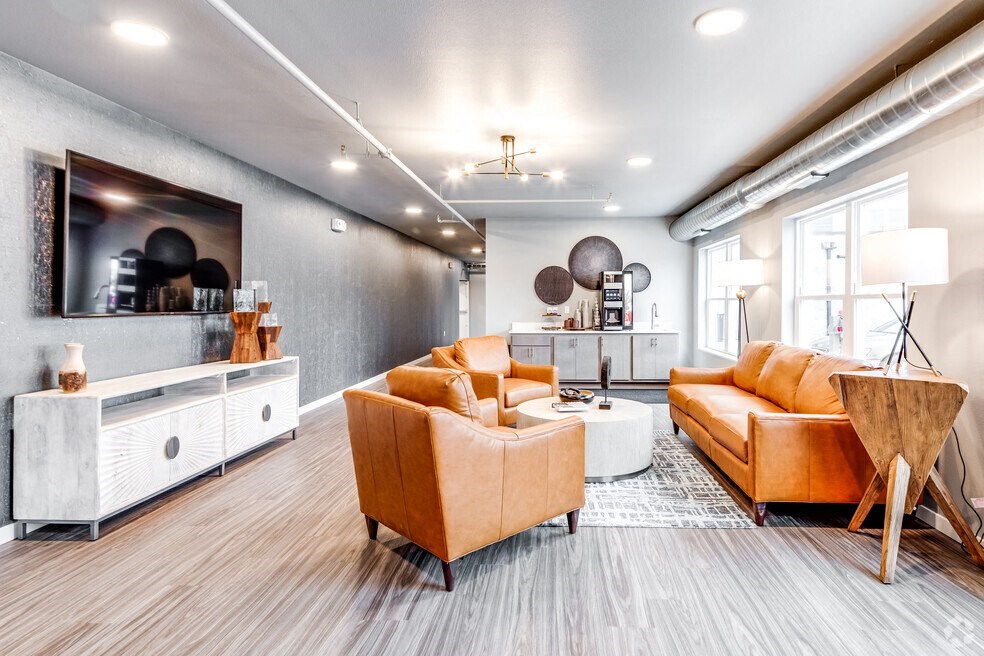 a living room with couches and a table