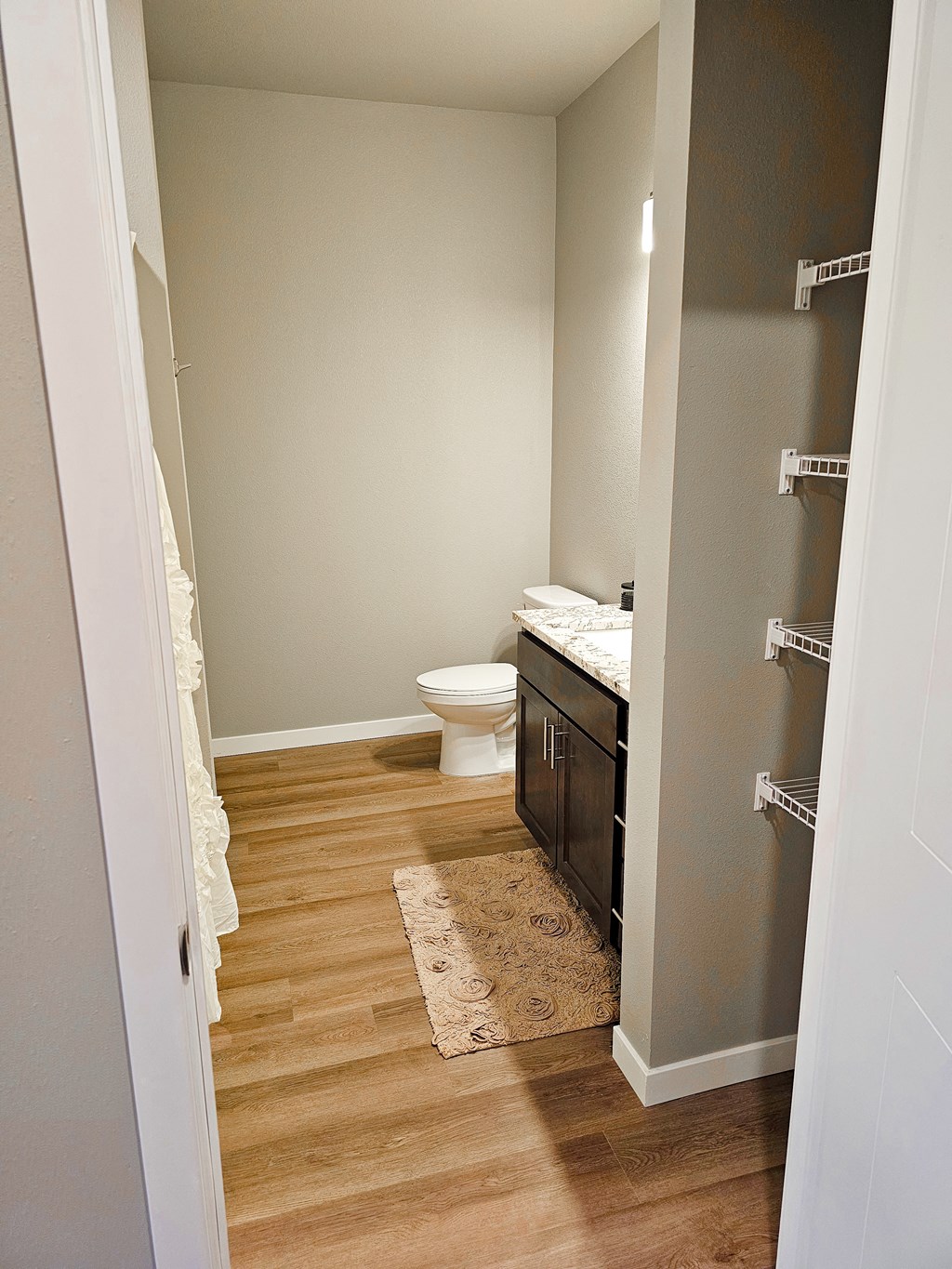 a bathroom with a toilet and a sink