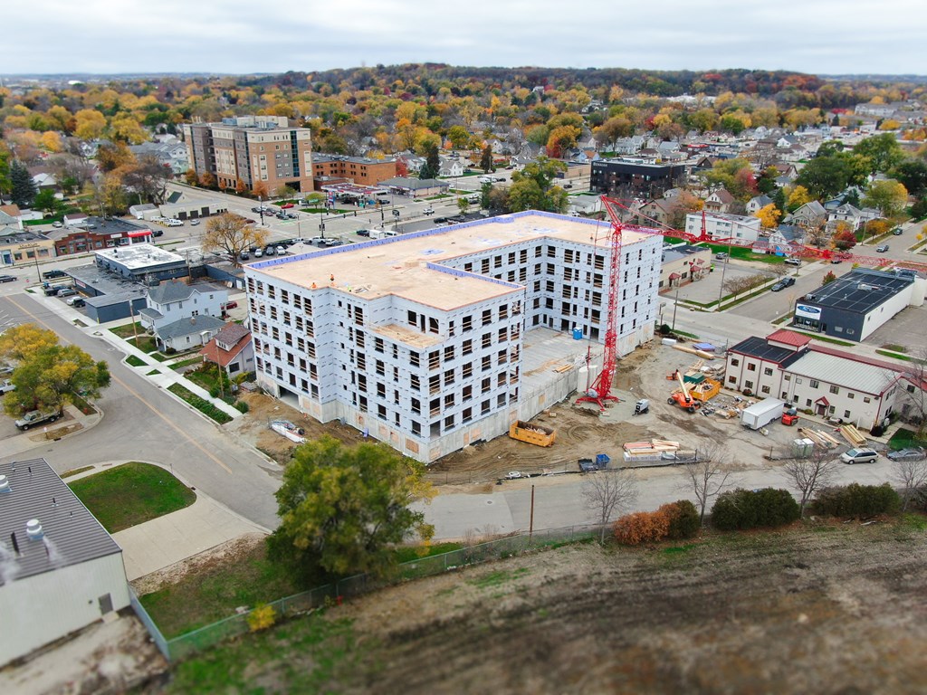 an aerial view of a building under construction in a city