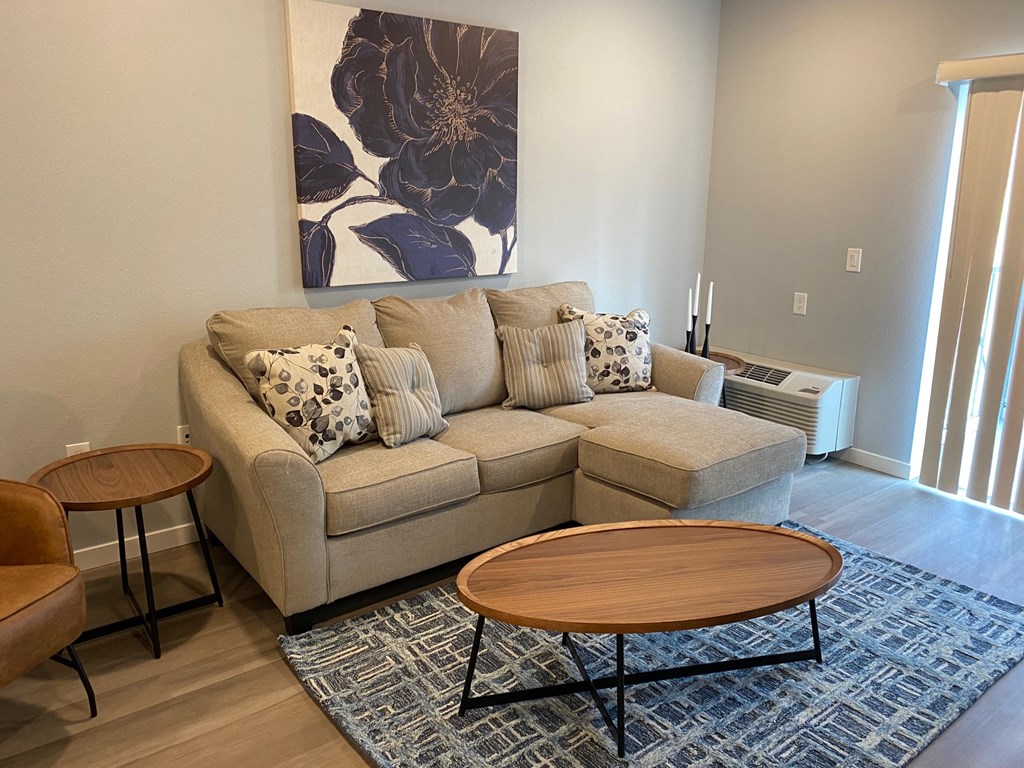 a living room with a couch and a coffee table