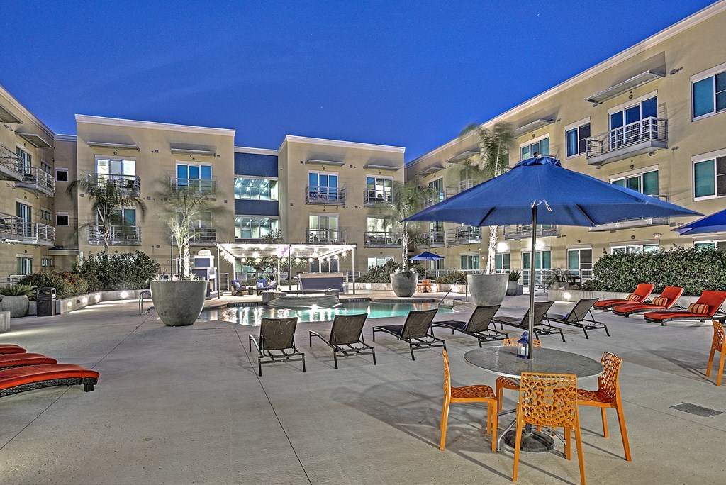 Landscape lighting creates outdoor ambiance in the beautiful pool courtyard at The Mosaic on Broadway, San Antonio, 78215