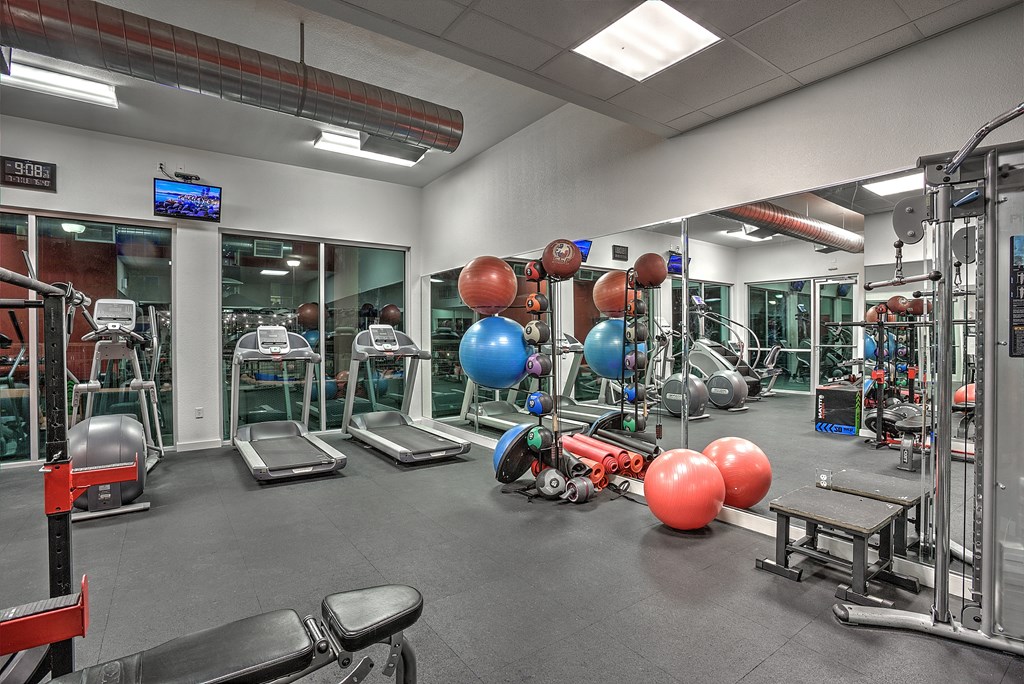 Multiple cardiovascular machines in large fitness center at The Mosaic on Broadway, San Antonio, Texas