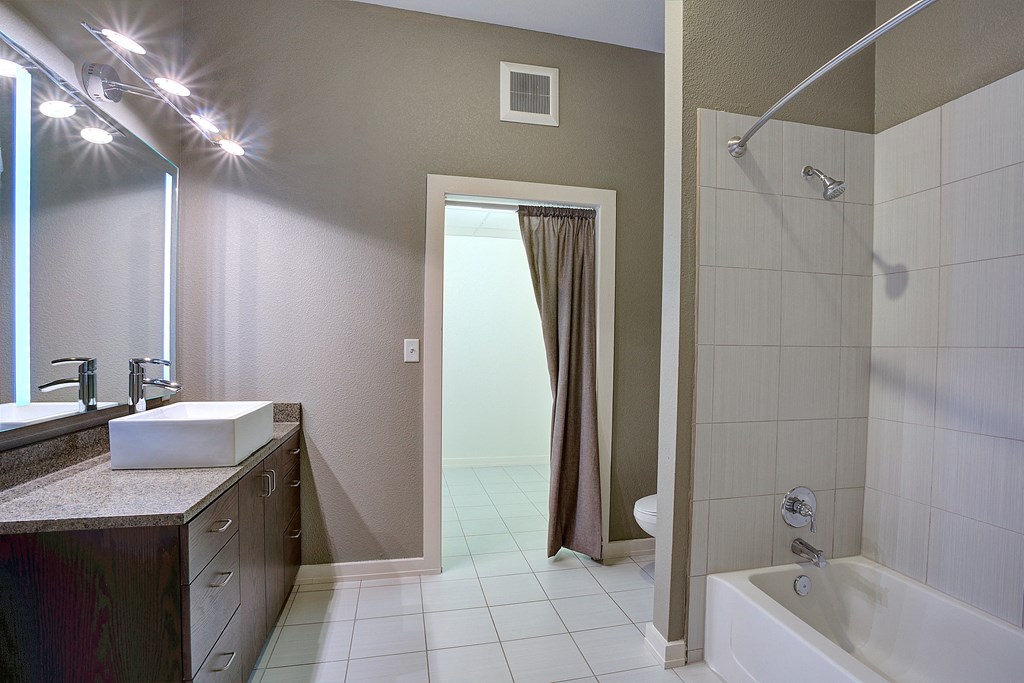 Upscale apartment Bathroom with Garden tub and shower and spacious walk in closet at The Mosaic on Broadway, San Antonio, 78215