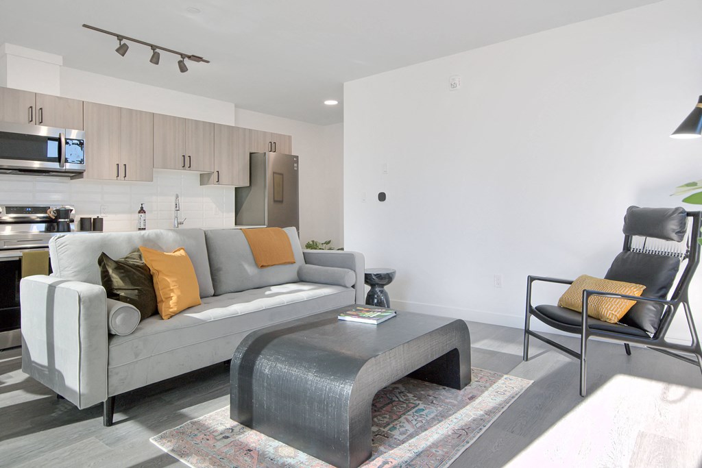 a living room with a couch and a coffee table