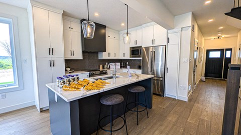 a kitchen with a counter top with food on it