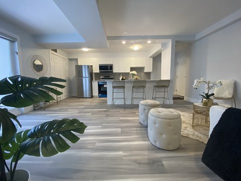 a kitchen and living room in a new home