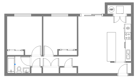 A floor plan of a house with a kitchen, living room, and bathroom.