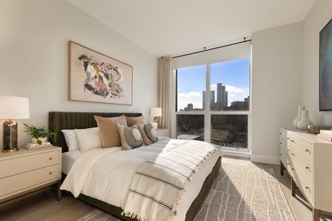 Large Bedroom with Natural Lighting and Large Windows