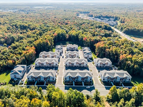 Aerial photo of the Boulders at Beekman offering another view of the residential buildings, landscaped grounds, and natural surroundings.