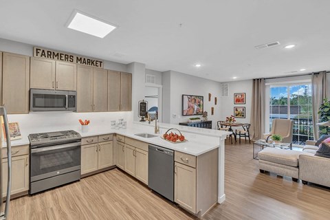 A kitchen with wooden cabinets and a white countertop.