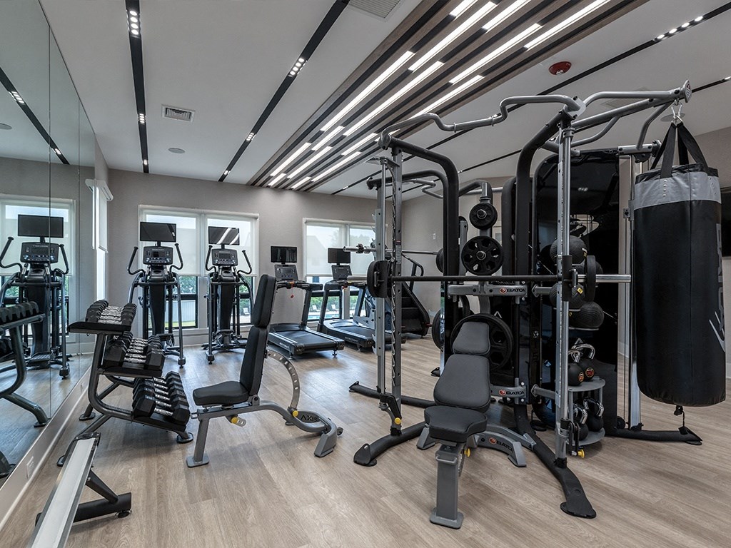 a gym with weights machines and other exercise equipment