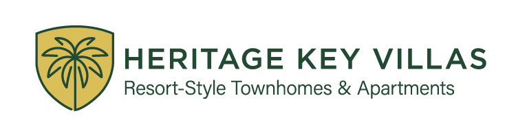 The image is a logo for Heritage Key Villas, which offers resort-style townhouses and apartments.