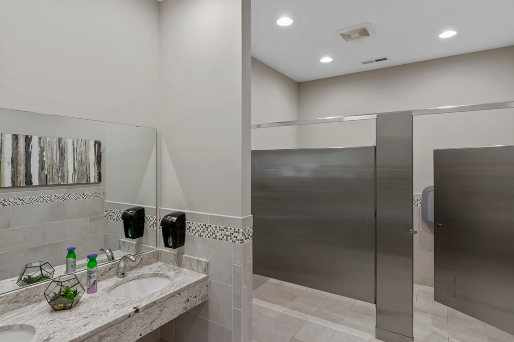 a bathroom with a sink and a shower