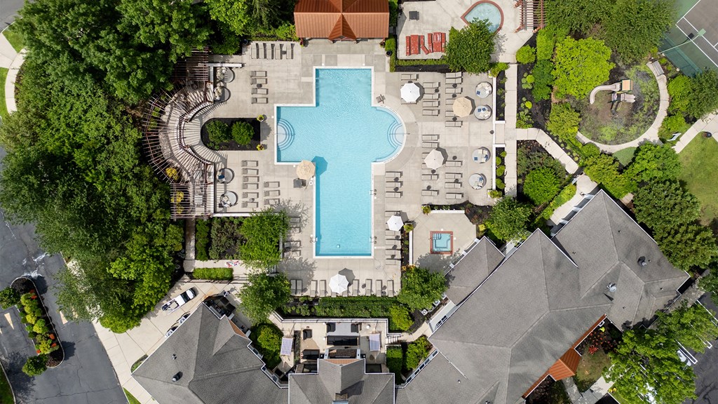 Aerial view of apartment complex in Princeton NJ with pool, hot tub, and playground