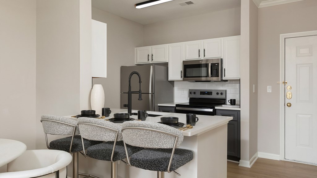 Renovated open-concept kitchen in a Princeton, NJ apartment for rent at The Mews at Princeton Junction. High-end appliances, modern finishes, and 2025 luxury apartment updates.