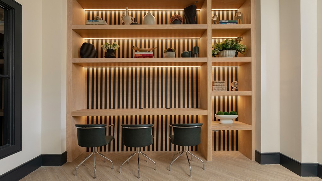 Built-in desk area with lighting and shelving at The Mews at Princeton Junction, ideal for work-from-home convenience in Princeton Junction apartments.