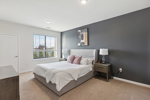 Cozy bedroom with ensuite bathroom at The Lofts at Middlesex