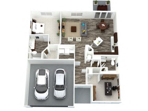 A top down view of a house with two cars parked in the garage.