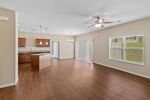 Bright and airy living space with large windows in ranch-style home