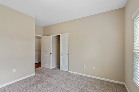 Bedroom with bathroom at The Villages of Florence and Weaver Mill