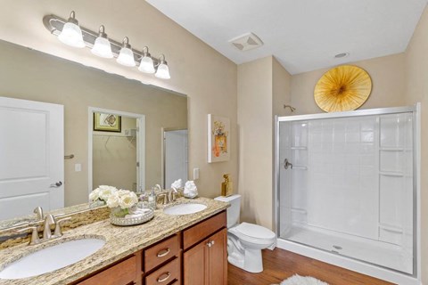 Stylish bathroom with walk-in shower and tile flooring in Florence, KY