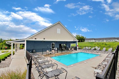 Private community pool with lounge chairs in Florence, KY