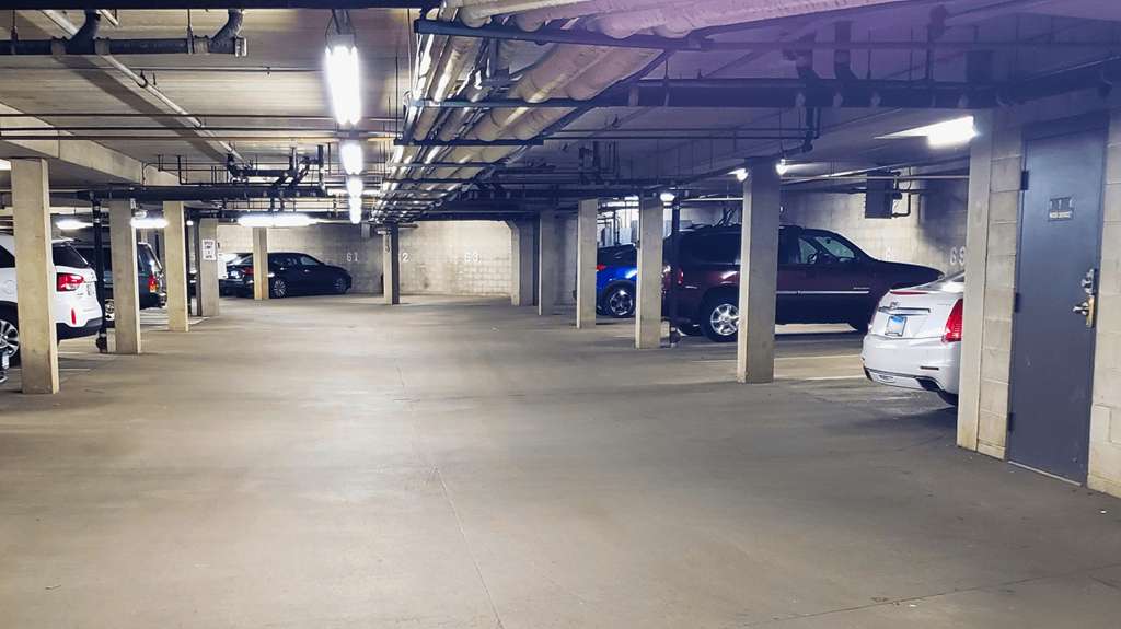 a parking garage with cars parked in it