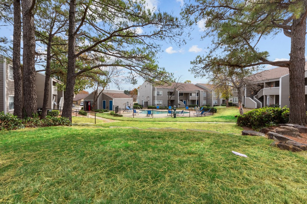 our apartments have a large yard with a swimming pool