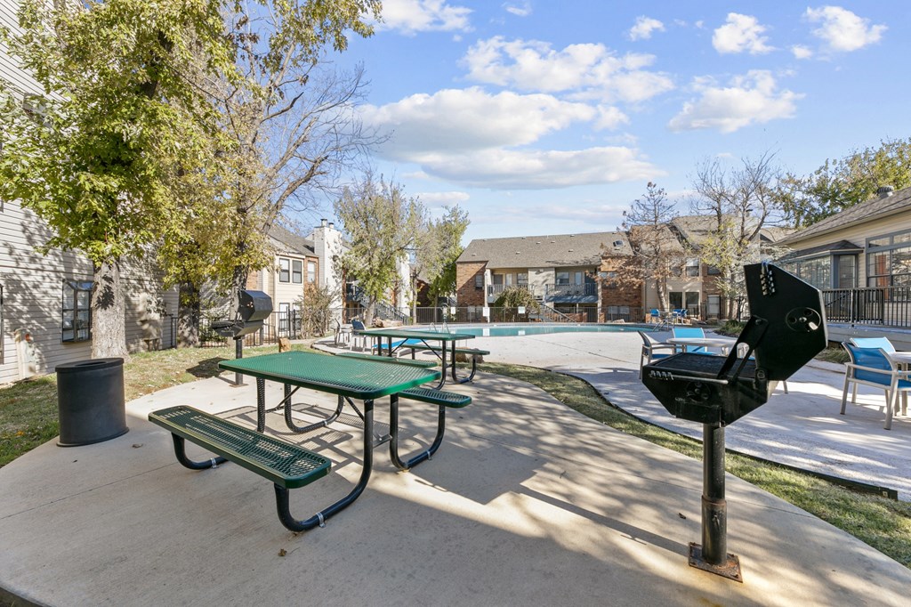 our apartments have a community picnic area with picnic tables and a pool