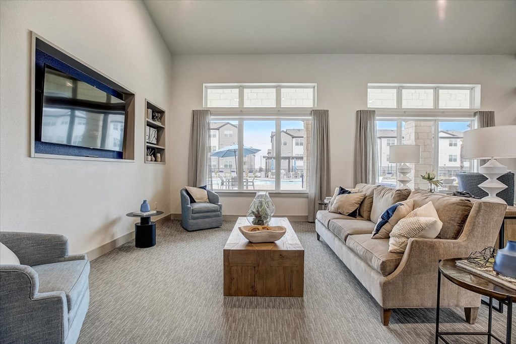 a living room with a couch and a table