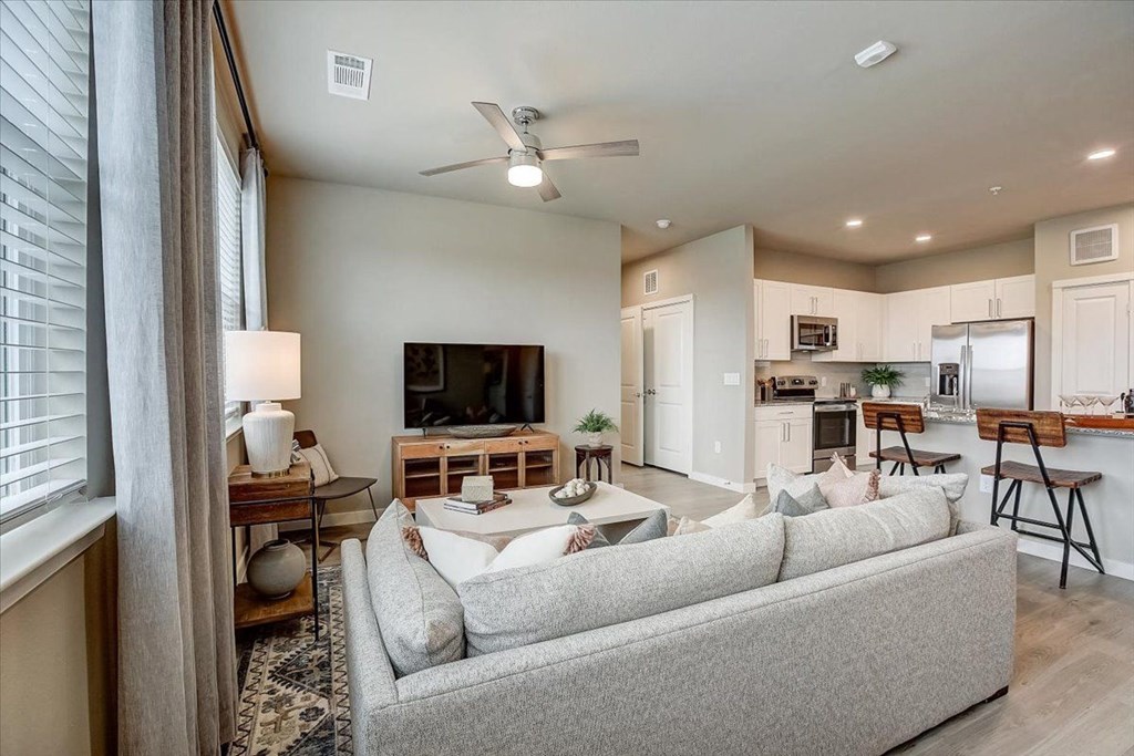 a living room with a couch and a table