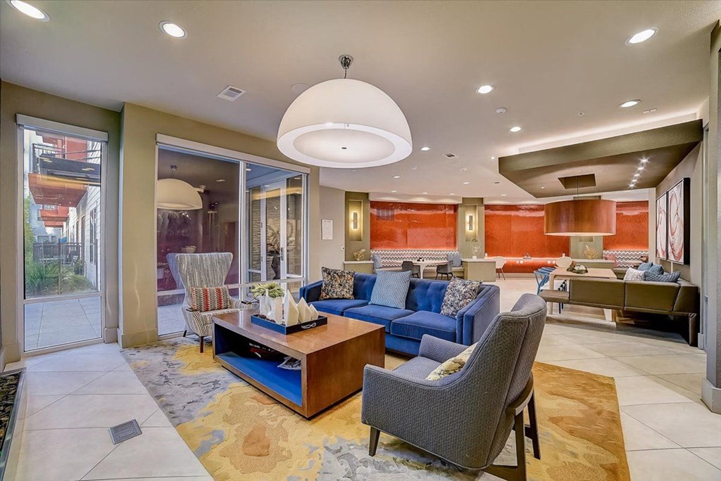 a living room with a couch and a table