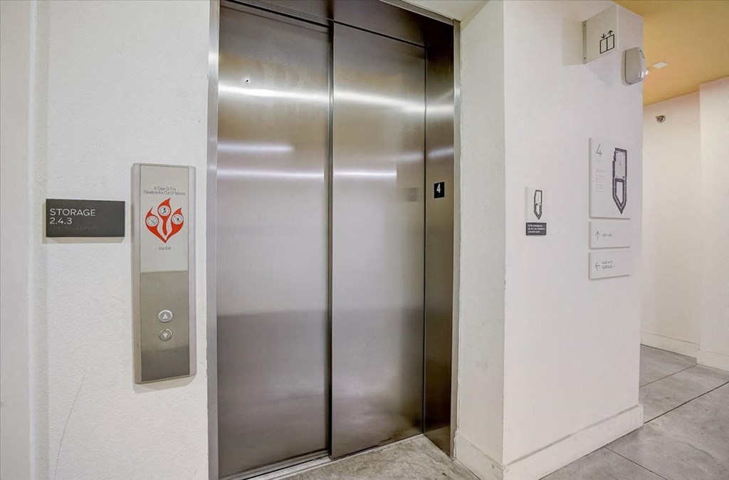 the elevator in the building has a heart sticker on it