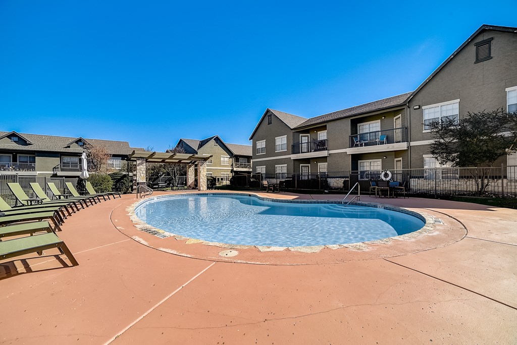 our apartments have a resort style pool with lounge chairs