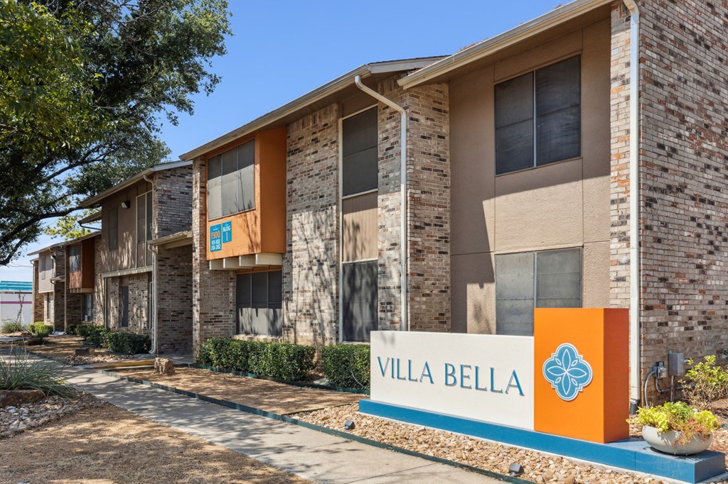 a building with a sign that says villa belle