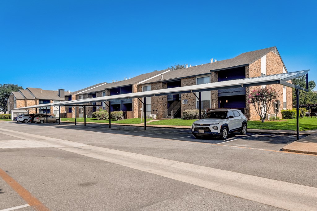 awnings at the whispering winds apartments in pearland, tx