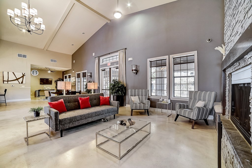 a living room with gray walls and a fireplace