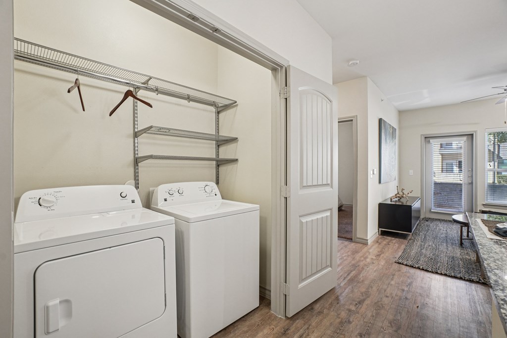 A laundry room with a washer and dryer.