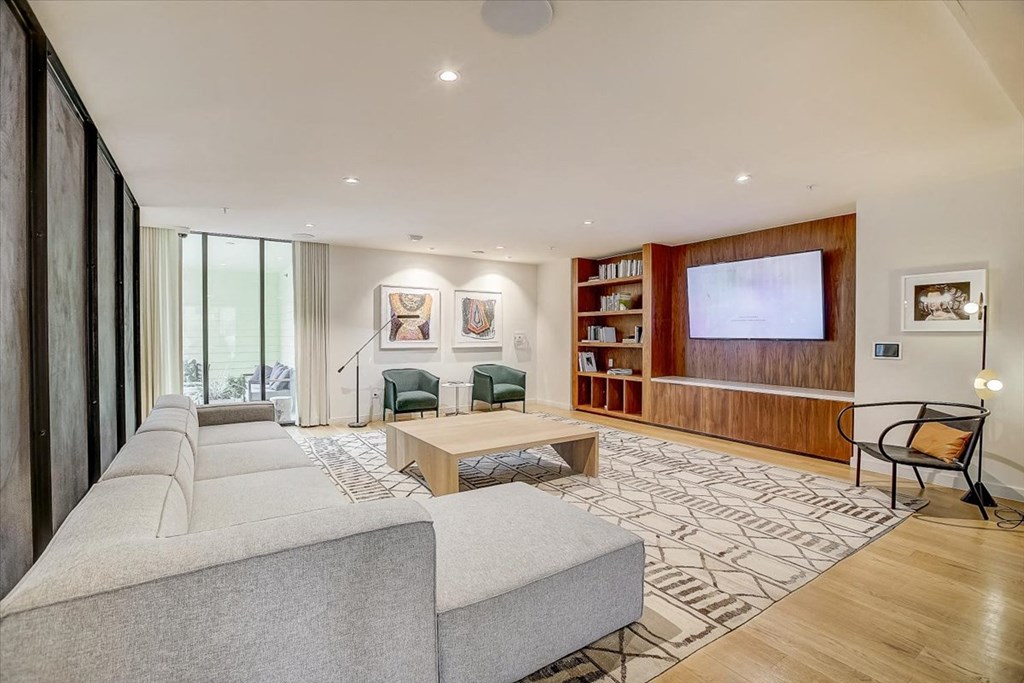 a living room with a couch and a television