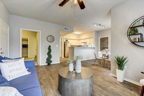 a living room with a couch and a table