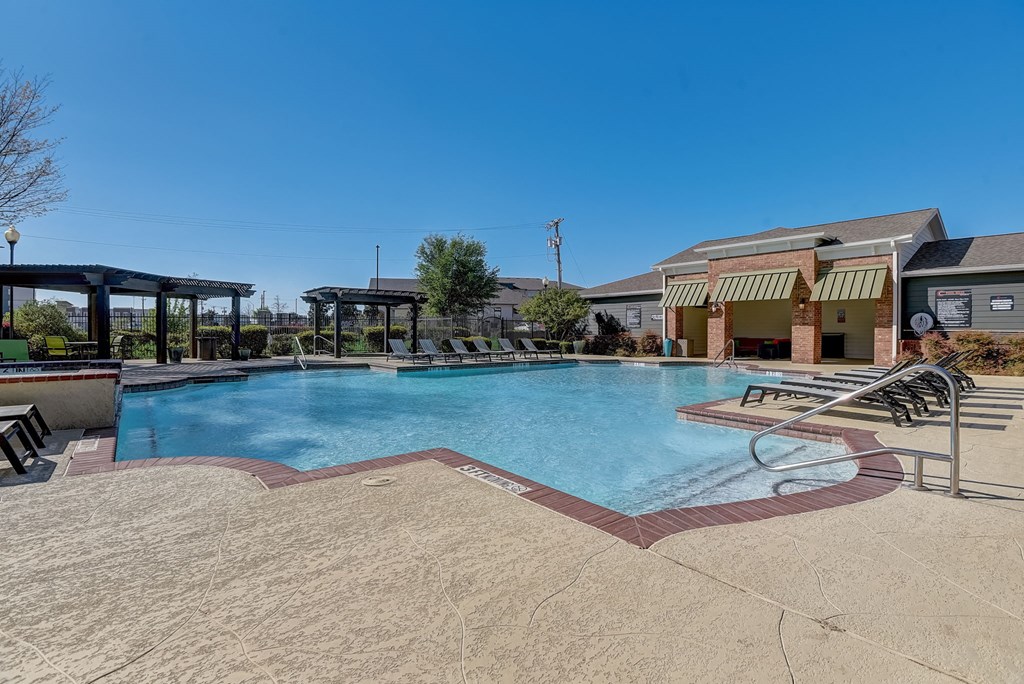 our apartments have a resort style pool with chairs