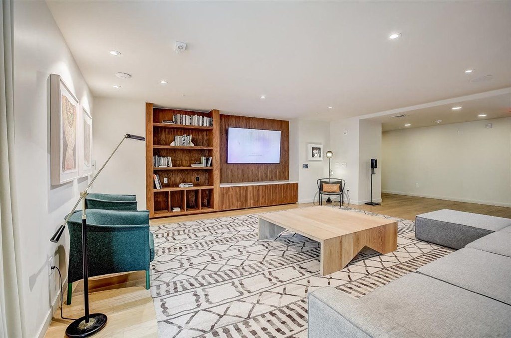 a living room with a couch and a tv