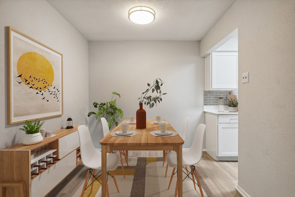 a dining room with a wooden table and white chairs