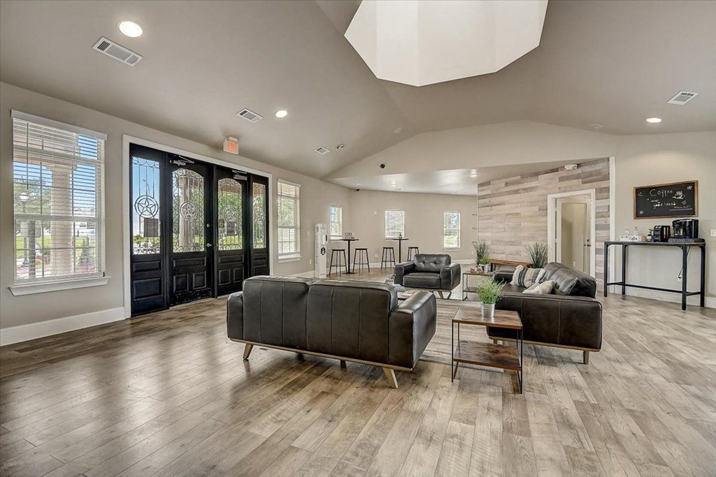 a living room with two couches and a coffee table