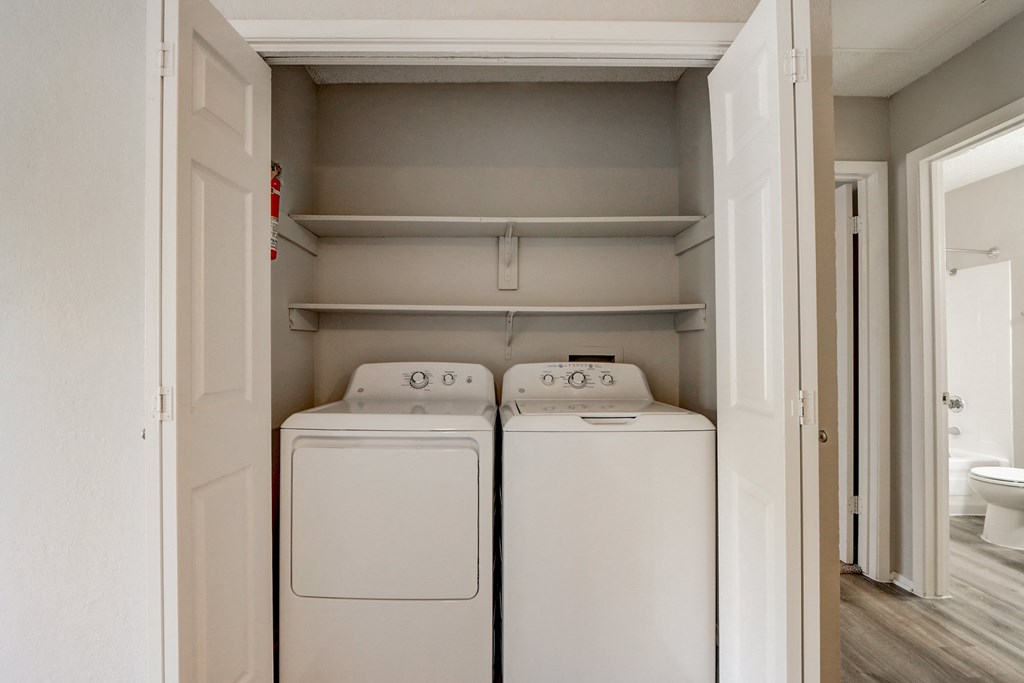 the laundry room has a washer and dryer