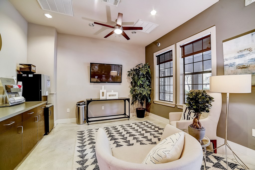 a living room with a couch and a tv