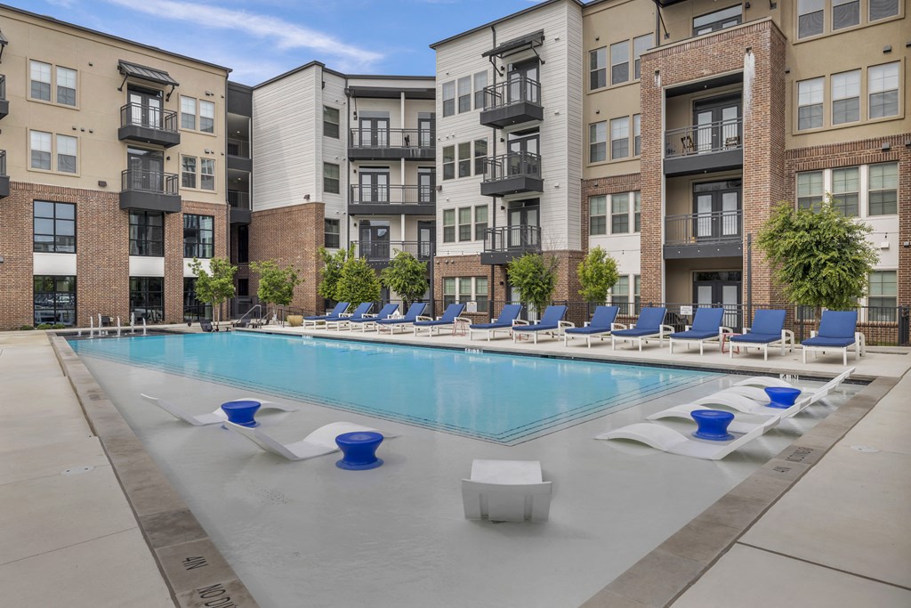 our apartments have a large pool with lounge chairs