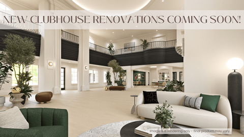 A modern living room with a green sofa and a large open space.